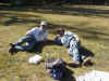 The men relax and watch me fish at Mallard Lake